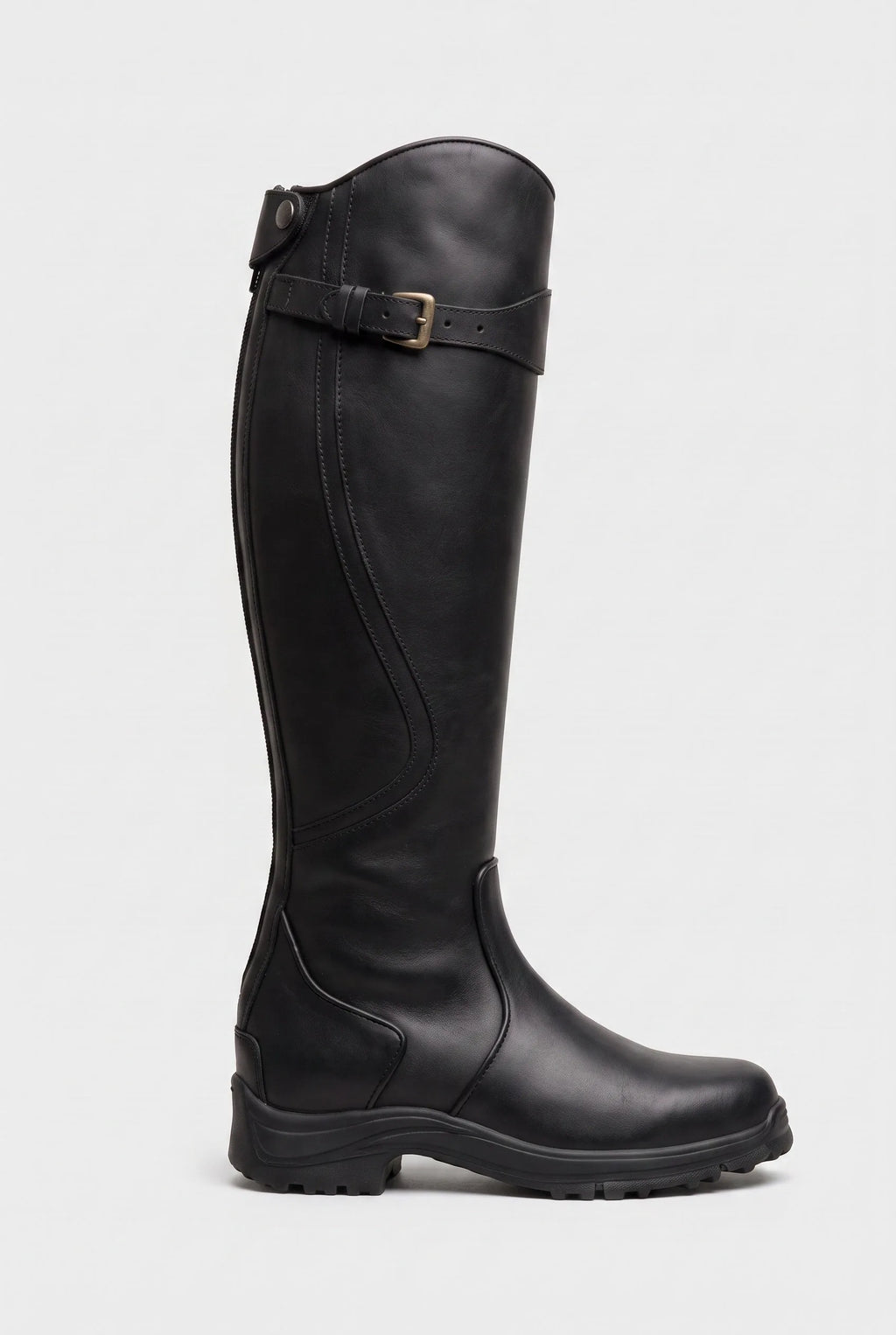 Side view of a matte black knee-high leather boot with buckle strap and sturdy ridged sole