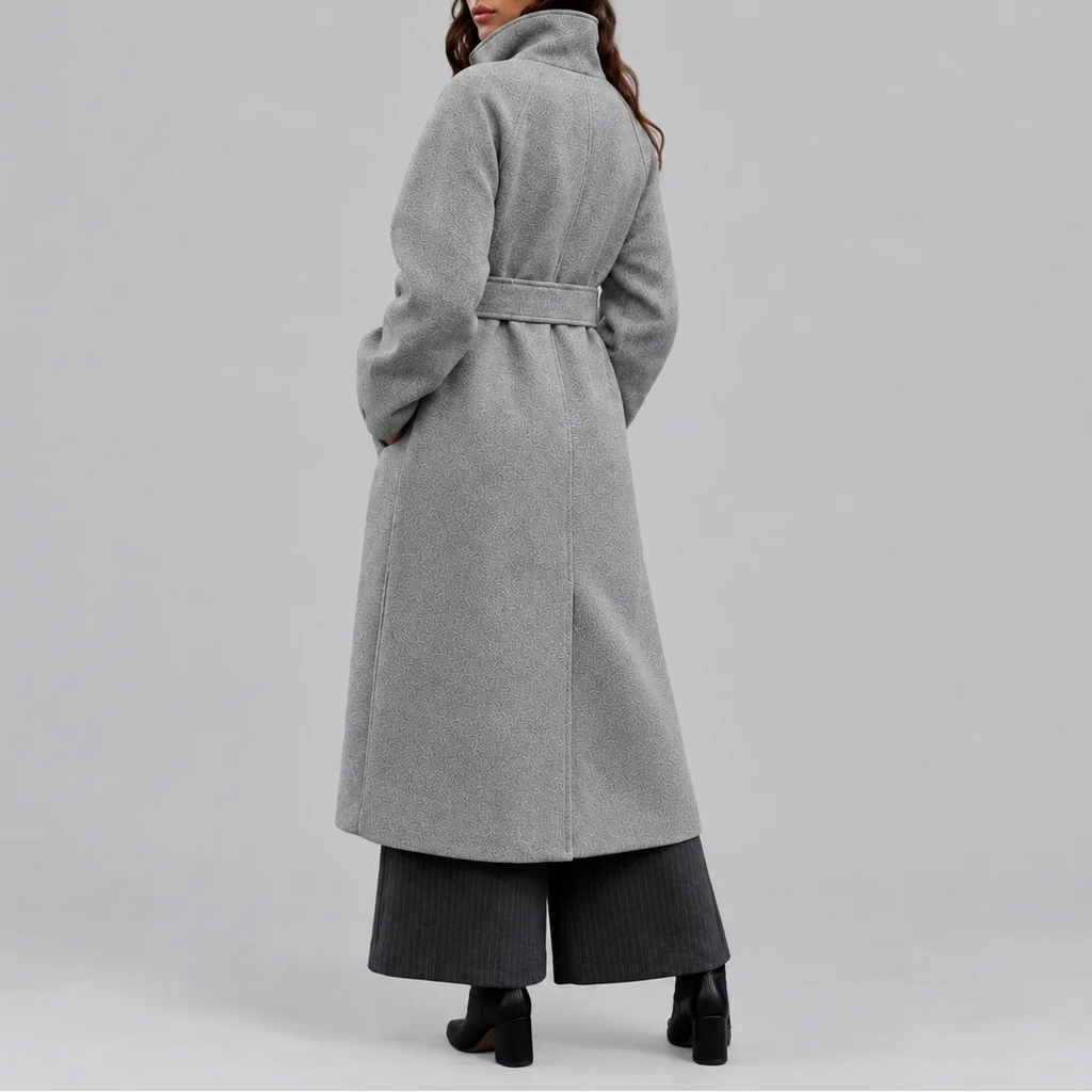 Back view of the grey wrap coat showing raglan sleeves and the tied waist belt